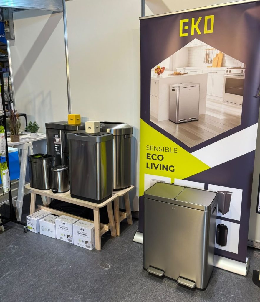 EKO pedal and recycling bins on display beside an EKO pull-up banner